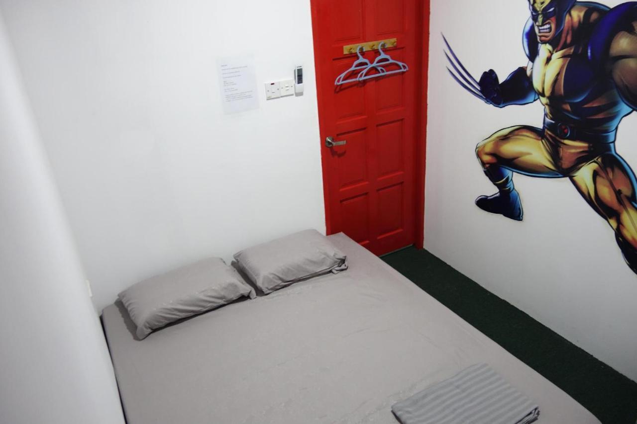 Hero Hostel Кучинг Экстерьер фото